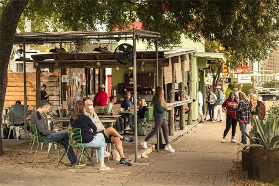 Photo of Neighbors Gathering at a Coffee Shop in Austin Texas
